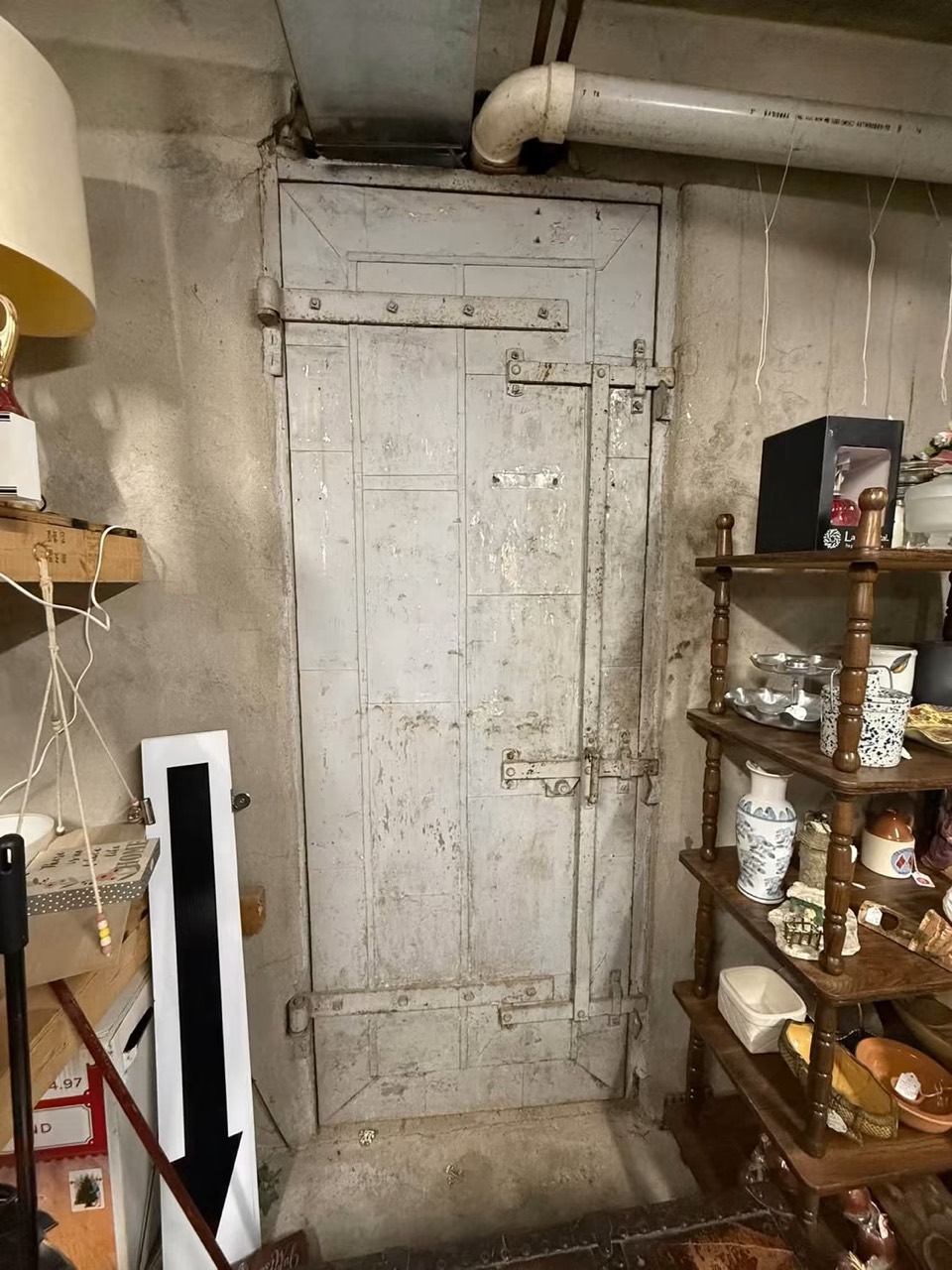 The old bank vault door still inside Serendipity, surrounded by shop displays